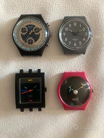 Lotto casse orologi swatch vintage funzionanti.