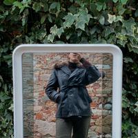 Giacca vintage in pelle nera pelliccia marmotta