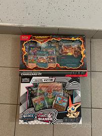 Collezione Charizard e Victini bianco nero pokemon