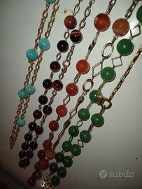 ornamentali composti da catenelle metalliche e pie