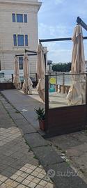 Veranda con ombrelloni