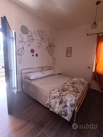 Camera quadrupla a 150 metri dal mare