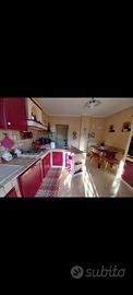 Cucina in legno e piastrelle Cotto Veneto