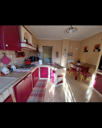 Cucina in legno e piastrelle Cotto Veneto