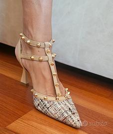 Eleganti scarpe col tacco