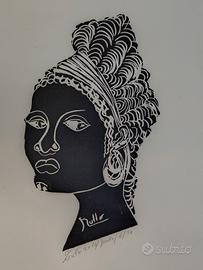 Stampa artistica linoleografia profilo di donna.