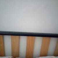 Letto singolo con rotelle e rete in doghe