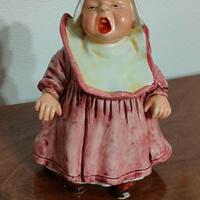 Antico SALVADANAIO in ceramica forma di bambina