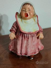 Antico SALVADANAIO in ceramica forma di bambina