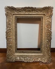 Cornice antica Cavalli Poli Cremona foglia argento