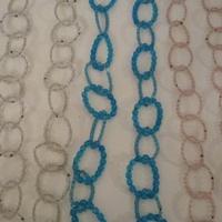 Collana lunga con cerchi in semicristalli