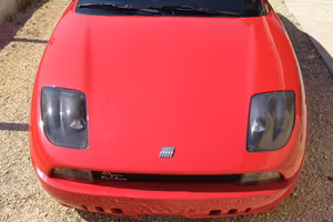 Fiat coupè Turbo rossa Ferrari 