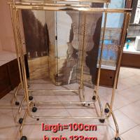 stender x abbigliamento in metallo dorato