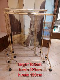 stender x abbigliamento in metallo dorato