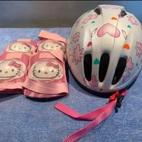 Caschetto e ginocchiere bicicletta