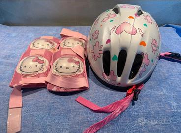 Caschetto e ginocchiere bicicletta