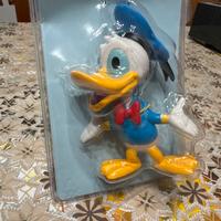 Topolino e paperino con libro