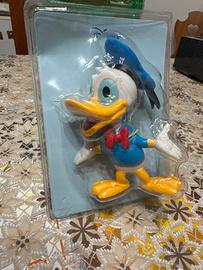 Topolino e paperino con libro