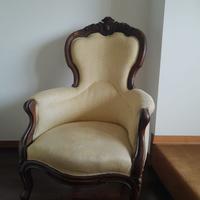Poltrona d'antiquariato in legno e tessuto