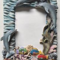 cornice portafoto delfini