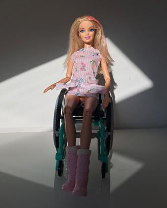 Barbie con sedia a rotelle