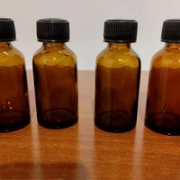 4 flaconi in vetro da 20 ml.