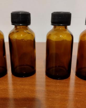 4 flaconi in vetro da 20 ml.