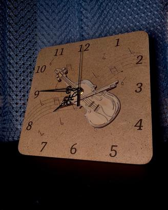 Orologio in legno incisi a laser - idea ragali