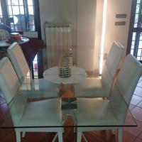 Tavolo in vetro e acciaio