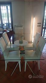 Tavolo in vetro e acciaio