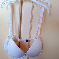 Reggiseno bianco  taglia 2,laterali in pizzo