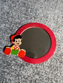 Specchio tondo in legno con pinocchio