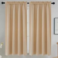 Due tende oscuranti beige
