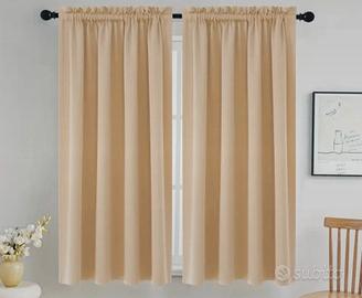 Due tende oscuranti beige