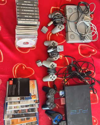 PlayStation 1 e 2 con accessori e giochi