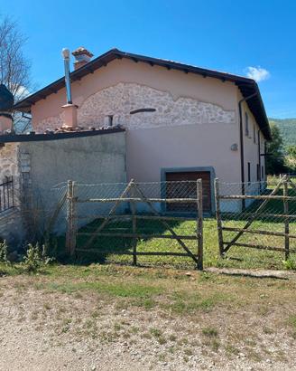 CASA E TERRENO 