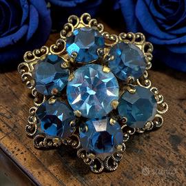 Spilla gioiello vintage 60s cristalli blu dorata