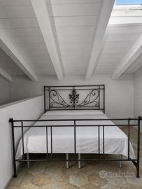 Letto matrimoniale in ferro battuto