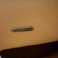 2 poltrone in pelle martellata gialla natuzzi