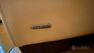 2 poltrone in pelle martellata gialla natuzzi