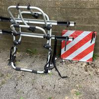 Portabici posteriore e segnale di carico sporgente