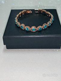 Bracciale Tennis Colore Oro Con Zirconi Azzurri