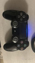ps4 con giochi e tre controller