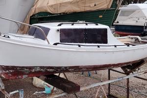 Pilotina con fuoribordo