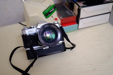 canon ae 1+ fd 50mm/vivitar 28/2,5 vintage anni 70