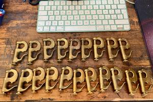 Moschettoni in ottone da ribattere