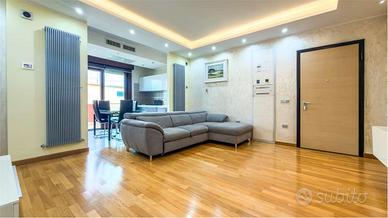 Elegante quadrilocale con posto auto