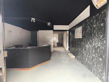 NEGOZIO A RESCALDINA