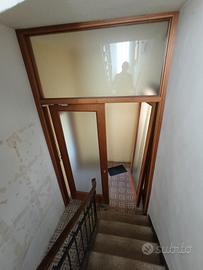 porta doppia scorrevole noce