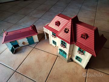 Casetta giocattolo con scuderia